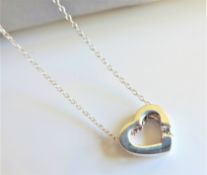 Diamond Heat Pendant Necklace in Sterling Silver