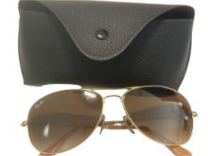 Lost property from our private jet charter. Ray-Ban with gold frame.