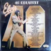 A collection of 12 x Elvis presley vinyl records.
