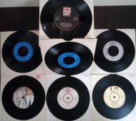 A collection of 50 vinyl records. Ian dury & the blockheads - Echo & the bunnymen etc