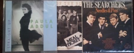 A collection of 65 x vinyl records.