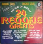 A collection of 3 x reggae vinyl records. Cocoa Tea, etc.