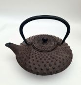Oriental Cast Iron Tea Pot or Kettle on Trivet Oriental Cast Iron Tea Pot or Kettle on Trivet.