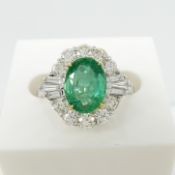 A fine quality emerald and diamond dress ring with a World Gemological Institute certificate