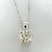 A sophisticated, 18ct white gold natural 1.09ct solitaire diamond necklace. Certificated and boxed