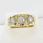 A 9ct yellow gold star-set 1.03ct graduated round brilliant-cut diamond gypsy-style ring