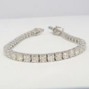 A traditional 7.60ct round brilliant-cut diamond tennis bracelet in 18ct white gold