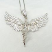 Stone-set winged lady pendant and chain in silver