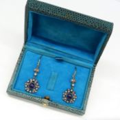 A pair of vintage-style, ornate drop earrings set amethysts, seed pearls and diamonds, boxed