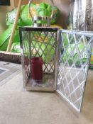 Small silver candle holder with glass