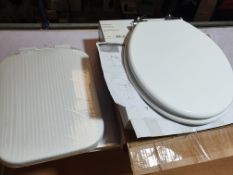 2 x Soft Close Toilet seats. 1 x Wood Traditional. 1 x Square