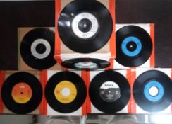 A collection of 50 x vinyl records. David Bowie -Dexys midnight runners - Bad Manners etc