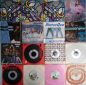 A collection of 54 x vinyl records - The Kinks - The Stray Cats - The Rolling Stones.