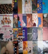 A collection of 75 x vinyl records.