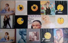 A collection of 24 x Madonna vinyl records.