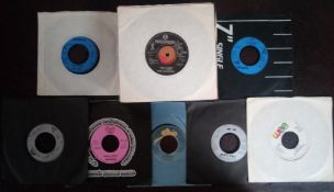 A collection of 46 x vinyl records. Dead or alive - Bob Marley - The style council etc.