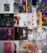A collection of 75 x vinyl records.