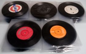 A collection of 115 x vinyl records. in clear protective covers.