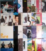A collection of 75 x vinyl records.
