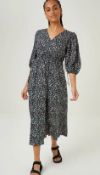 Mixed Adult / Teen Clothes. To Include Dresses, Skirts, Blouses & Summer Tops. Contents Of Cage (H6