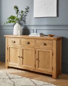 RRP £869. Faversham Assembled Oak 3 Door 3 Drawer Sideboard. (H.81 x W.137 x D.40cm). IX266PS