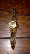 A Ladies Vintage Omega Wristwatch With Rolled Gold Bracelet.