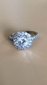 Lovely sparkly CZ Cluster Ring set in Silver.