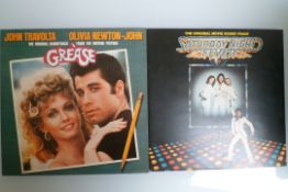 2 x Grease & Saturday night fever vinyl records.
