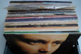 Approx 46 rock / pop etc vinyl records.