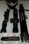 An Olympus 410 DSLR digital camera / 2 x lenses / Hoods / Tripod / Battery & charger