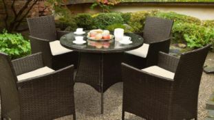 Brand New Boxed Rattan Round Dining Table Plus 4 Chairs including Pads and Covers