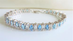 Sterling Silver 16ct Blue and White Topaz Bracelet New with Gift Box