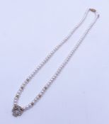 Diamond Cross on Pearl Necklace