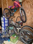 3x bikes with helmets