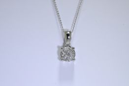 Diamond Pendant Set in 18 Carat Gold.