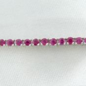 3.21 carat claw-set ruby articulated line bracelet in 18ct white gold