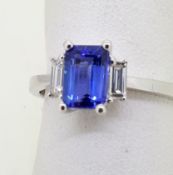 18CT (750) White Gold Emerald Cut Tanzanite and Diamond Ring