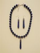 A Lapis Lazuli Necklace and Earrings Set With Obelisks