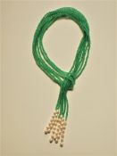 A Three Very Long Strands of Jade and Pearls Necklace.