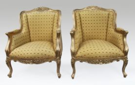 Pair of Louis XVI Style Carved Gilt Bergère Armchairs