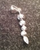 White metal and white stone pendant