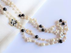 Black and White Number 5 Pearl Necklace 28 inches Long