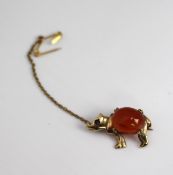 Gold Rhino Form Brooch with Carnelian & Ruby Eyes