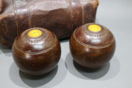 Cased Pair of Early 20th c. Lignum Vitae Bowls