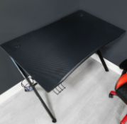 (67/Mez) RRP £119. X-Rocker Ocelot Gaming Desk (W115x D73.5x H77cm). Carbon Fibre Effect Desktop...