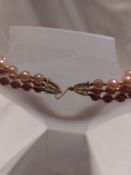 Pearl Necklace and Pink Necklace