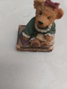 Teddy on suitcase