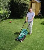 (161/Mez) RRP £120. Bosch Rotak 34-13 Corded Lawnmower. 1300W Motor. Grass Combs Enable Cutting C...