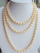 52 Inch Opera Length Single Strand Pearl Necklace