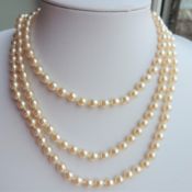 48 Inch Opera Length Single Strand Pearl Necklace